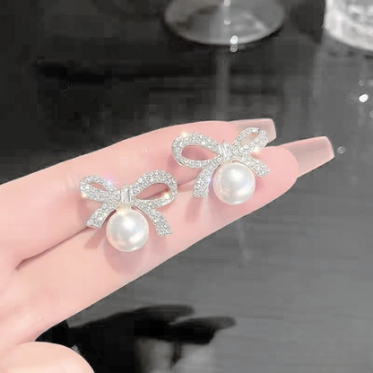 PJX-113 Bow Knot Pearl Earrings with Zircon HHC